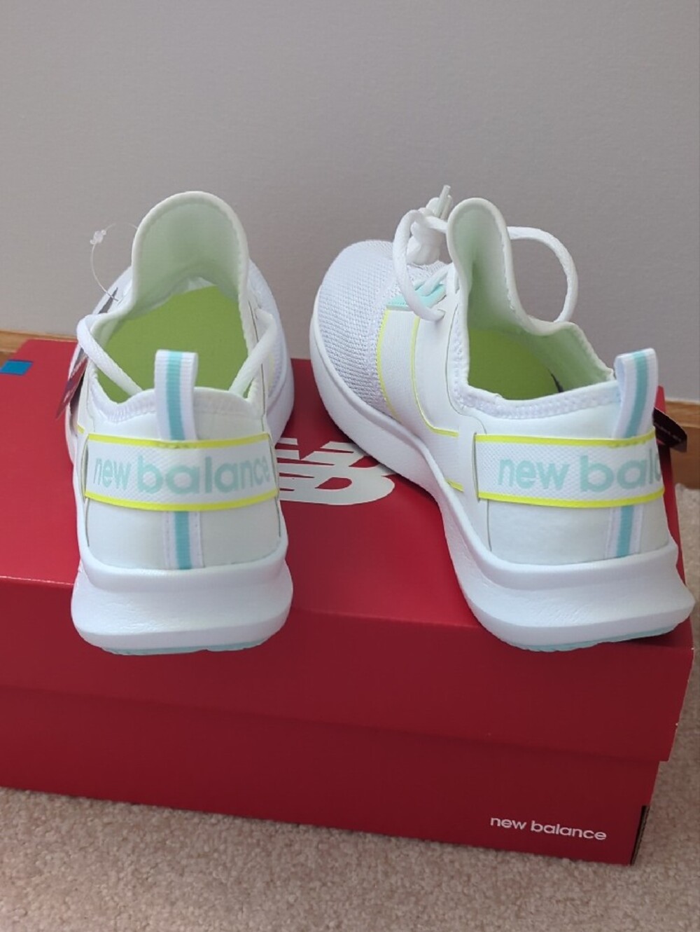New Balance Women's White Athletic Sneakers with Blue & Yellow - Picture 2 of 11